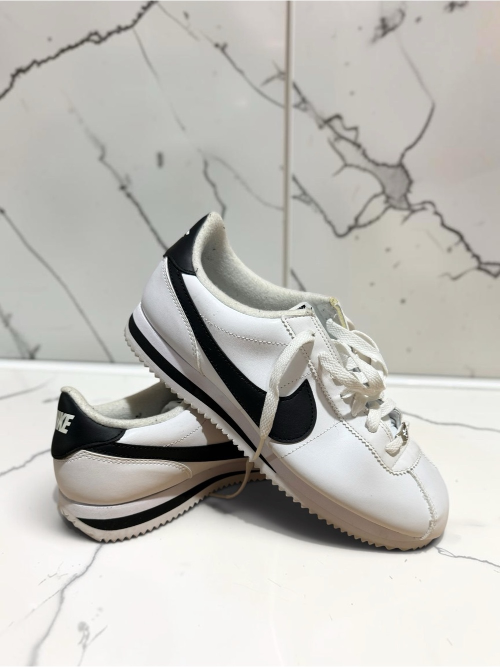 Nike Men’s White Leather Sneakers with Black Swoosh